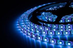 A close up of some blue lights on a black background