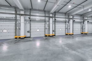 Warehouse loading docks with closed doors.