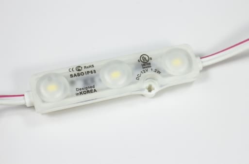 White LED module with three lights.