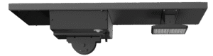 Ceiling-mounted industrial equipment with attached light.